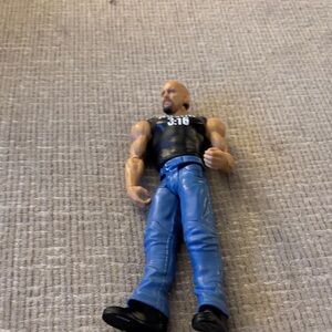 Action Figure with Black Top and Blue Pants